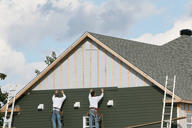 Professional Siding technician working in East Pittsburgh, PA